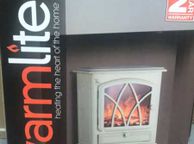 main image for ad 2KW Cream Freestanding Stove Heater