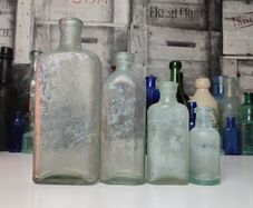 266 - Set of 4 Vintage Universal Medicine Chemicals Clear Glass Decorative Collectible Bottles