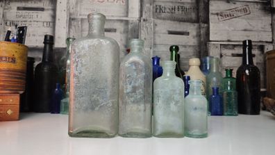 266 - Set of 4 Vintage Universal Medicine Chemicals Clear Glass Decorative Collectible Bottles