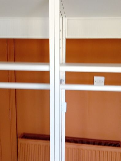 Two open wardrobe hanging rails Ikea Platsa