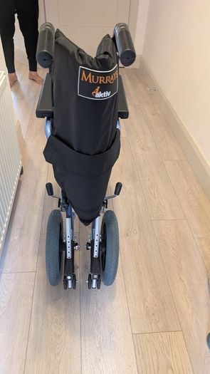 Folding wheelchair, excellent condition