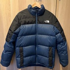 The North Face Dark Blue Hoodless Puffer Jacket