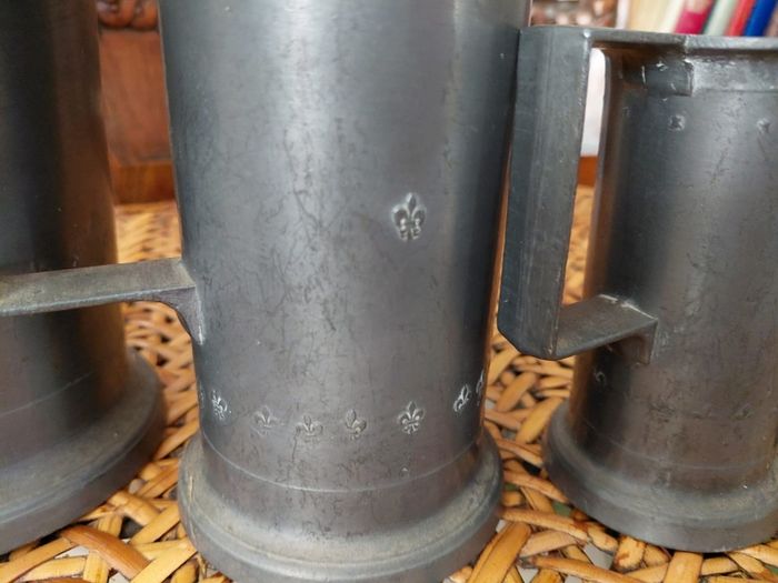 Antique French solid pewter measuring tankards Fleurs de lys complete set