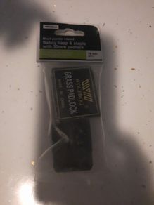 safety hasp with brass padlock