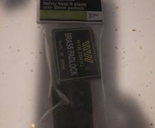 safety hasp with brass padlock