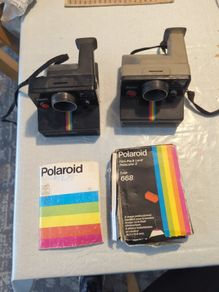 2 No. Polaroid cameras