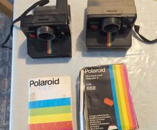 2 No. Polaroid cameras