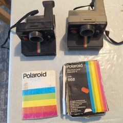 2 No. Polaroid cameras