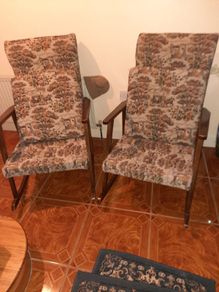 pair of vintage rocking arm chairs