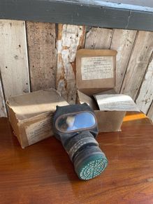 2 vintage gas masks with boxes. Air Raid Precautions..