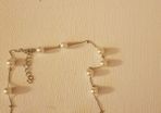 Pearl design necklace, bracelet and earrings