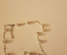 Pearl design necklace, bracelet and earrings