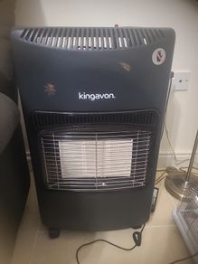 portable gas heater and full cylinder of gas