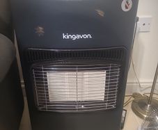 portable gas heater and full cylinder of gas