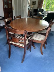 Bright Mahogany dining table with six chairs
