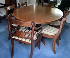 Bright Mahogany dining table with six chairs