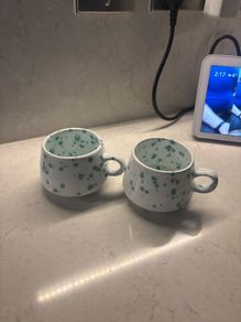 2 Speckled coffee cups bought in Greece