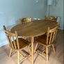 Sturdy wooden dining table and four chairs set Image 3