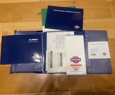 2001 Nissan Almera user manual & warranty book.