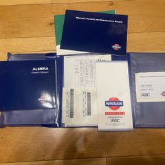2001 Nissan Almera user manual & warranty book.