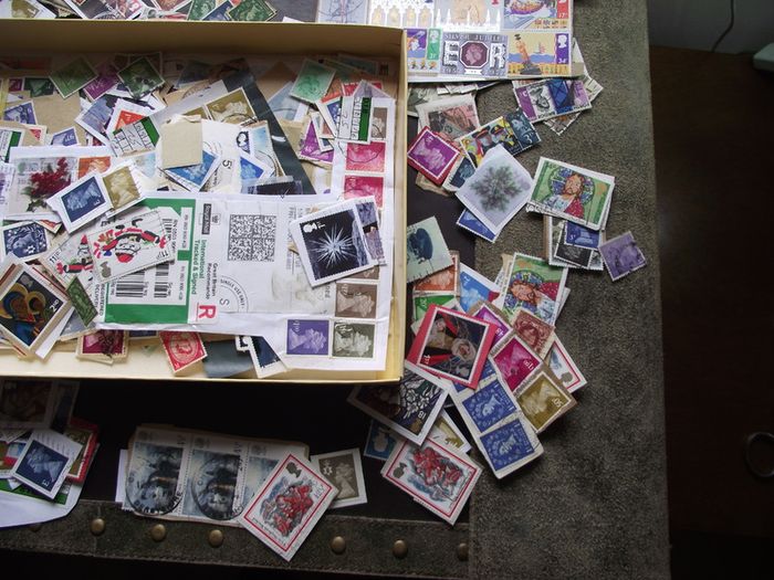A box with collection of stamps from Great Britain