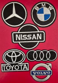 Car emblems,  embroidered badges.