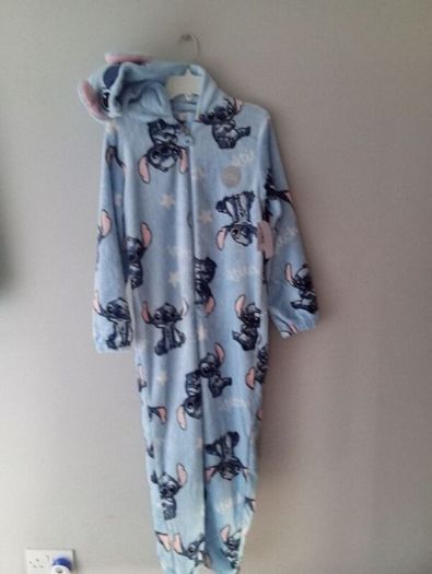 girls stitch onesie new. Aged 11-12 years
