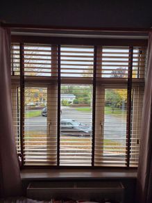 Wooden slatted venetian blinds