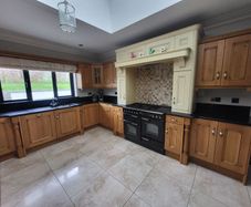 solid oak kitchen, Island with granite top & Dresser.  Dresser can be sold separately