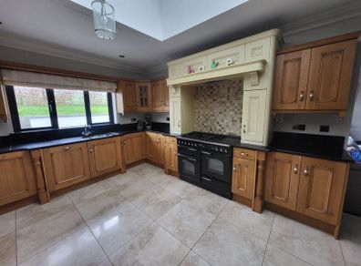 solid oak kitchen, Island with granite top & Dresser.  Dresser can be sold separately