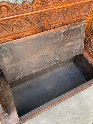 Late Victorian Gothic Revival Carved Oak Hall Settle.