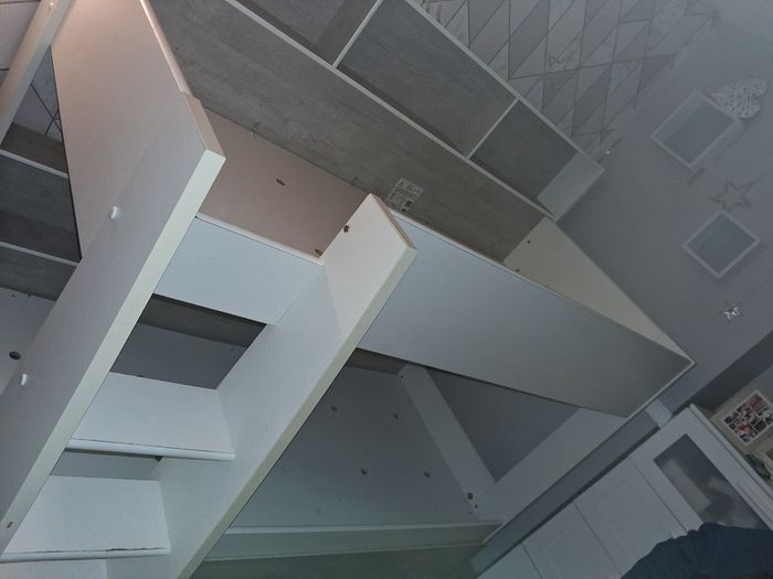 Bunk beds with integrated shelving