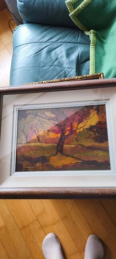 Framed under glass oil panting on board of land scape signed M.M KENNA