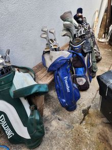 five golf bags and sixty nine clubs . ONE LOT ONLE.