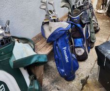 five golf bags and sixty nine clubs . ONE LOT ONLE.