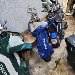 five golf bags and sixty nine clubs . ONE LOT ONLE.