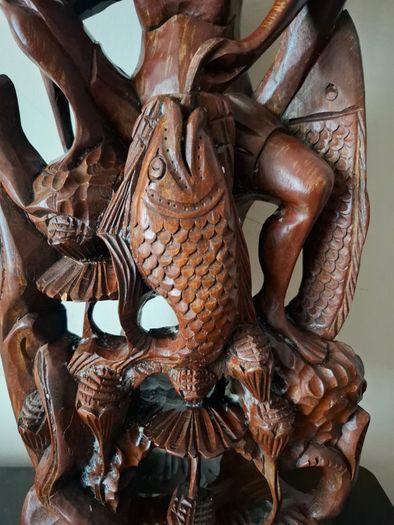 Hand carved wooden Balinese sculpture Fisherman