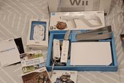 Nintendo Wii. Wireless controllers x2. Wii Classic Controller. Wii Zapper. Games X3.