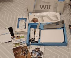 Nintendo Wii. Wireless controllers x2. Wii Classic Controller. Wii Zapper. Games X3.
