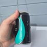 vintage Guinness Radio Can shaped like a can with a telescoping antenna Image 2