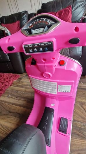 Vespa Pink Electric Scooter
