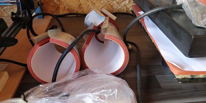 Heat press machine with mug and hat attachments