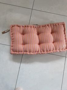 Large padded outdoor cushion with handle