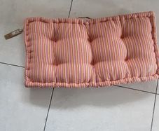 Large padded outdoor cushion with handle