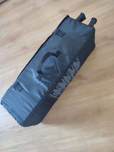 Black travel cot
