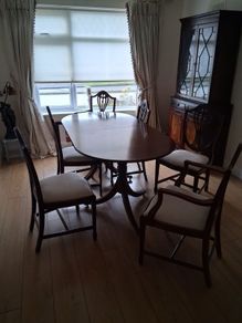 Dining Room Tables and chairs ( Six lovely soft cushion Mahogany chairs with adjustable Mahogany Dining room table.