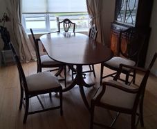 Dining Room Tables and chairs ( Six lovely soft cushion Mahogany chairs with adjustable Mahogany Dining room table.