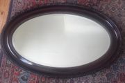 Edwardian oval bevelled mirror.