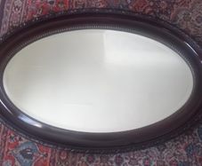 Edwardian oval bevelled mirror.