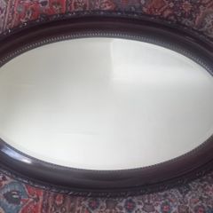 Edwardian oval bevelled mirror.